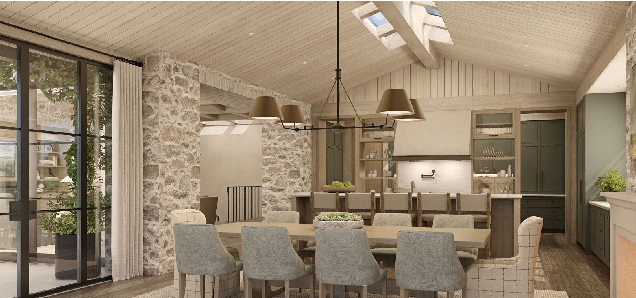Kitchen with Wolf range and vaulted skylit ceiling